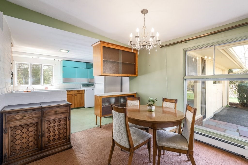 617 Edgell Road Framingham, MA 01701 - Photo 8 of 26 a view of a dining room with furniture window and outside view