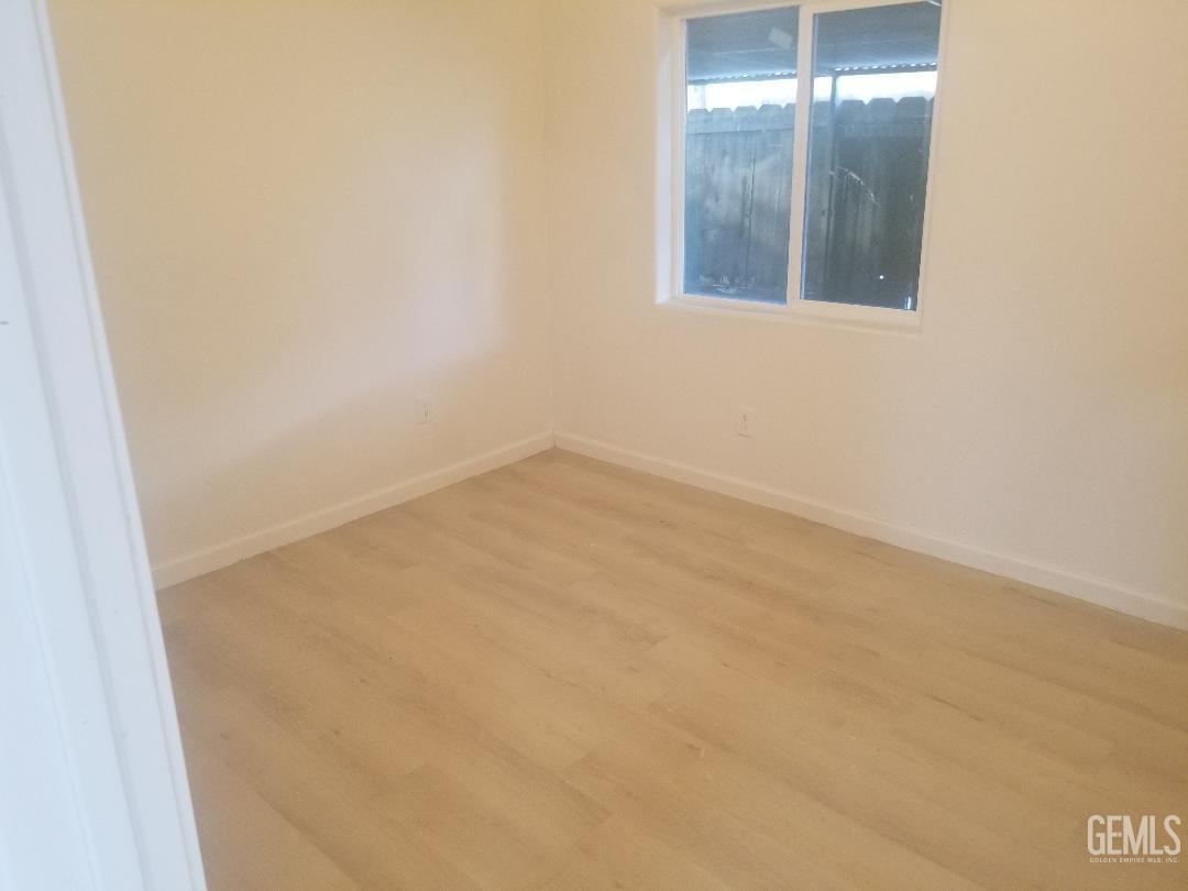 Undisclosed Address Bakersfield, CA 93304 - Photo 7 of 9 an empty room with a bathroom