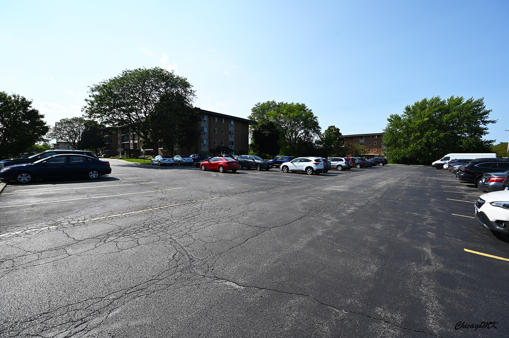 2234 South Goebbert Road, Unit 422 Arlington Heights, IL 60005 - Photo 27 of 27 a view of car parked on the side of the road