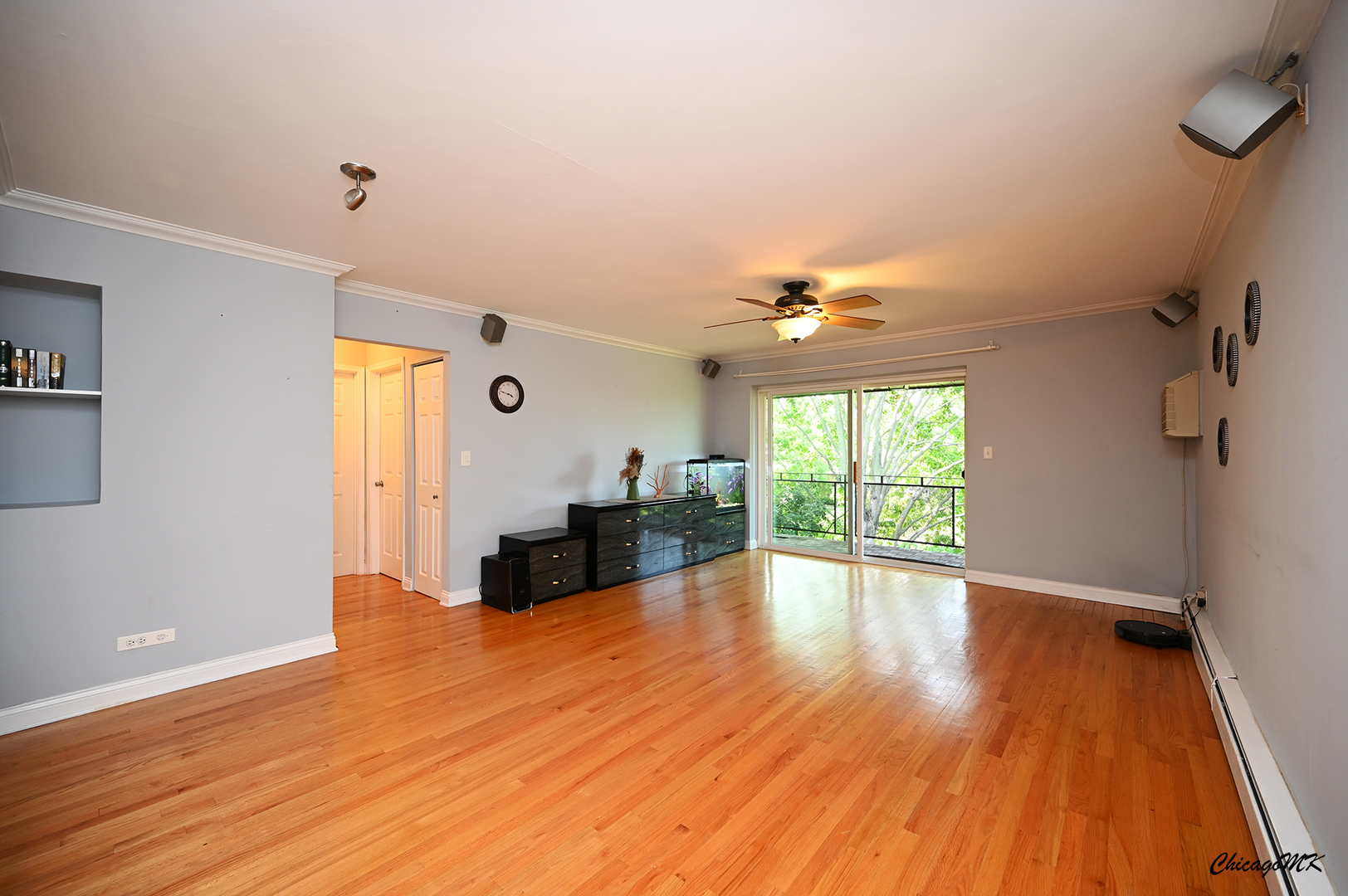 2234 South Goebbert Road, Unit 422 Arlington Heights, IL 60005 - Photo 3 of 27 wooden floor in an empty room with a window