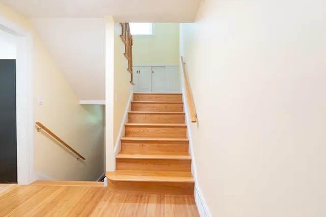 a living room with furniture window and a couch