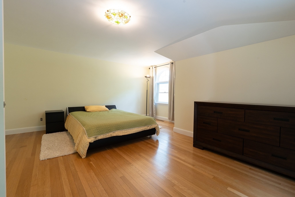 5 Fairview Road Canton, MA 02021 - Photo 21 of 28 a bedroom with a bed and a night stand