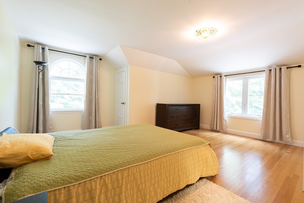 5 Fairview Road Canton, MA 02021 - Photo 22 of 28 a bedroom with a bed and wooden floor