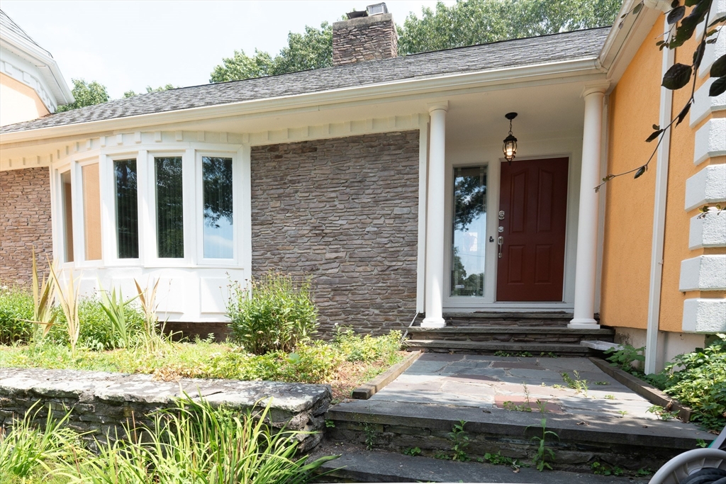 5 Fairview Road Canton, MA 02021 - Photo 25 of 28 a view of a front door of house with a yard