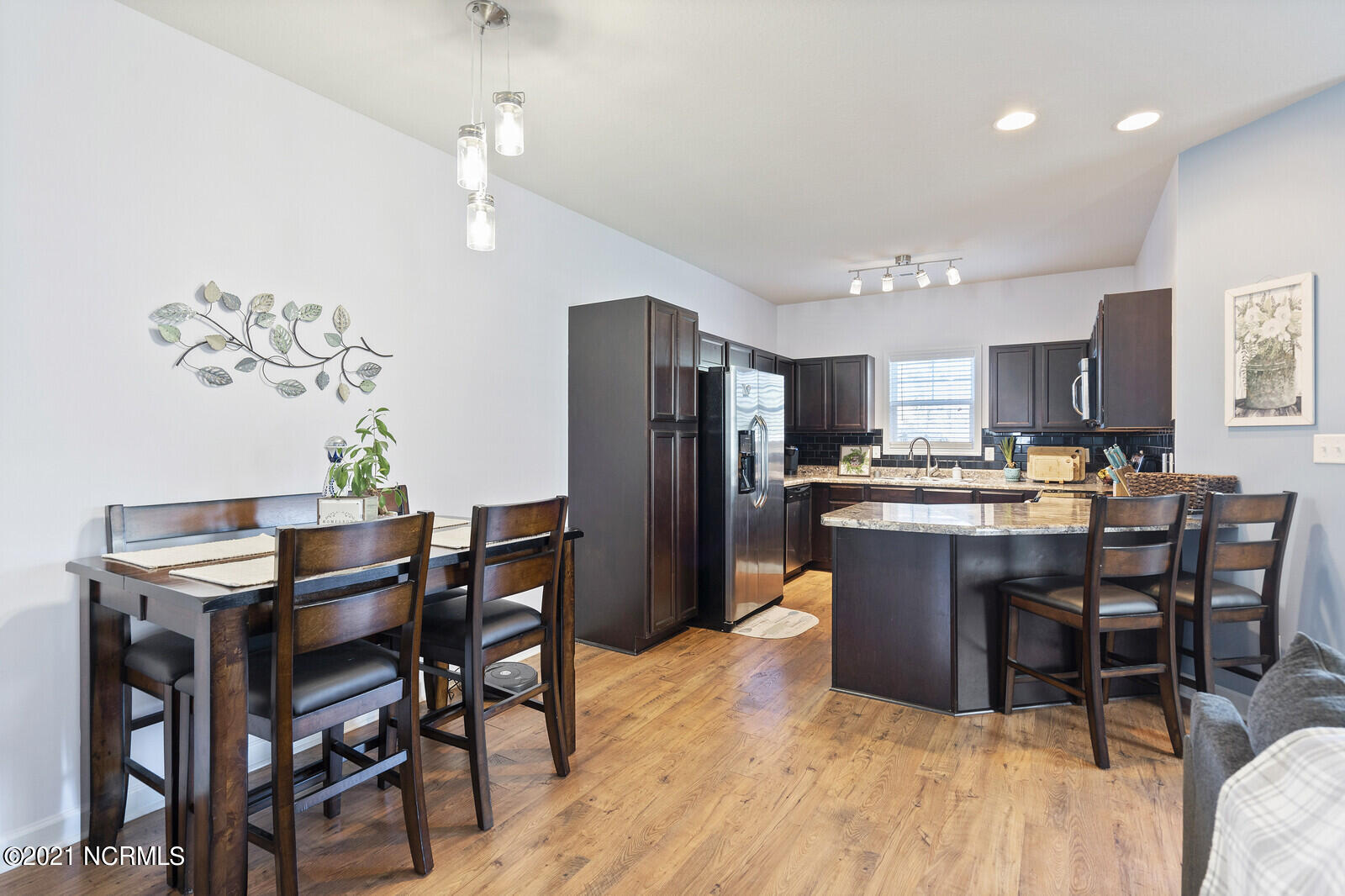 307 Frisco Way Holly Ridge, NC 28445 - Photo 9 of 51 Dining Area and Kitchen
