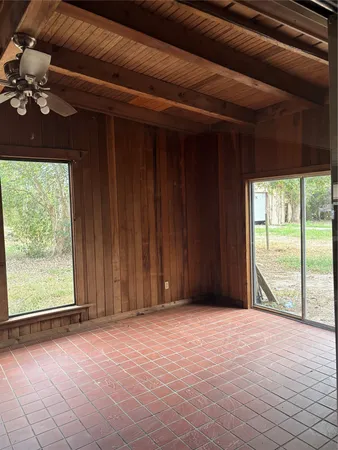 an empty room with windows