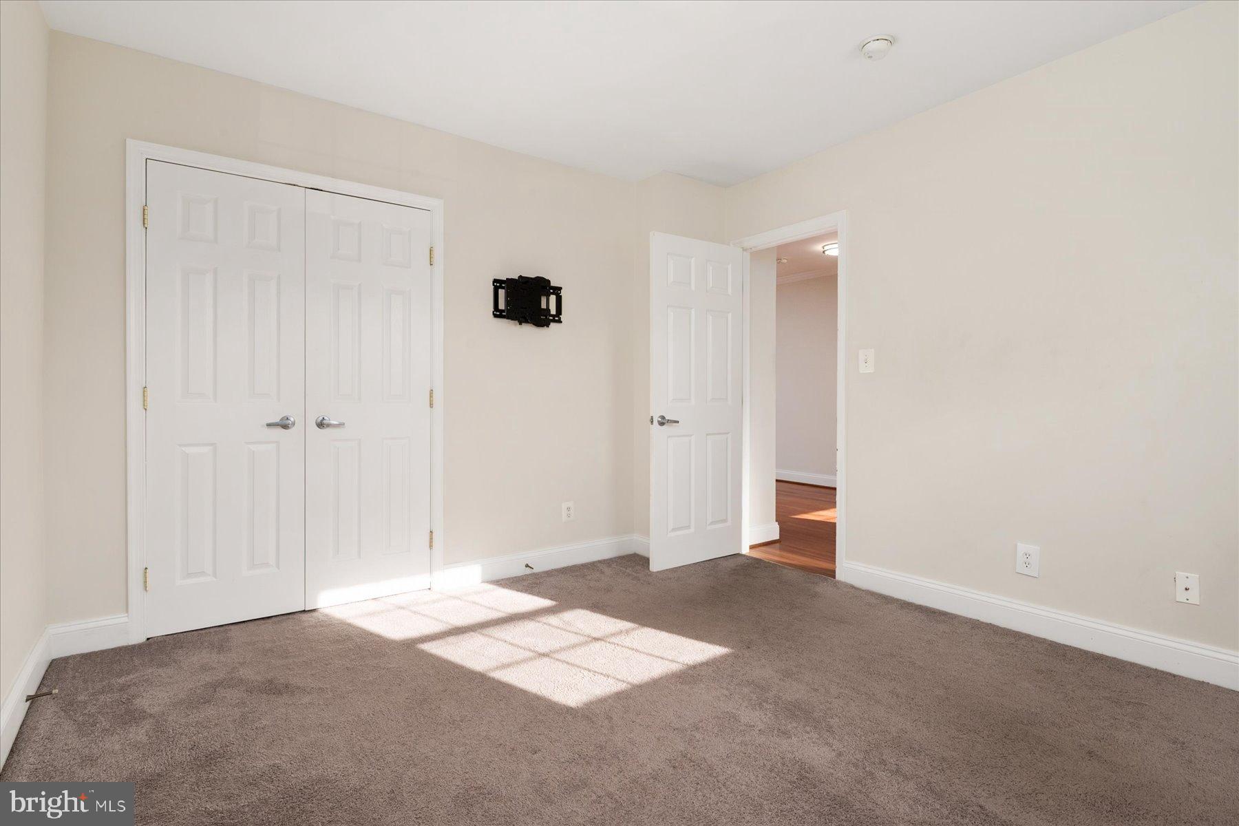 19 Post, Unit AVENUE 203 Laurel, MD 20707 - Photo 20 of 32 a view of a room with an empty room