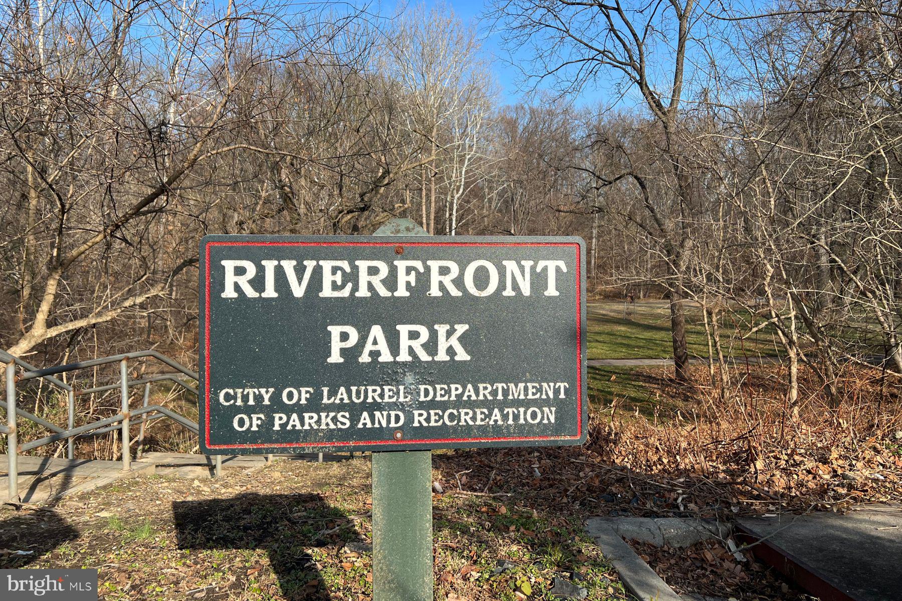 19 Post, Unit AVENUE 203 Laurel, MD 20707 - Photo 28 of 32 a sign broad on the side of the road