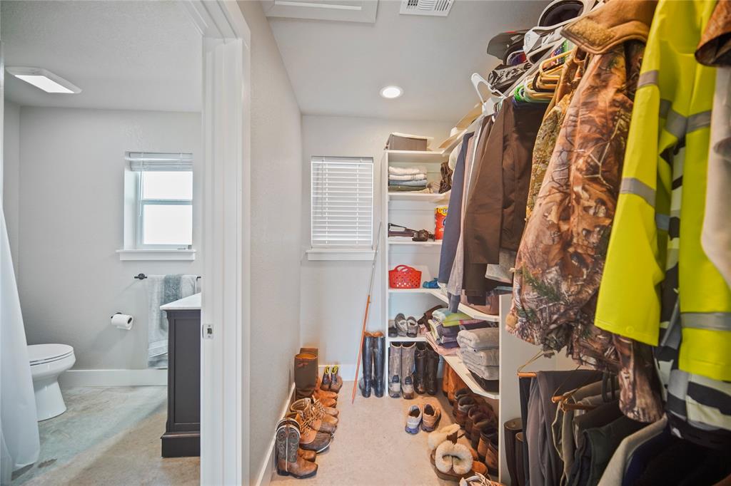 131.7-acres Roney Road Jacksboro, TX 76458 - Photo 13 of 40 a bathroom with a sink toilet and shower