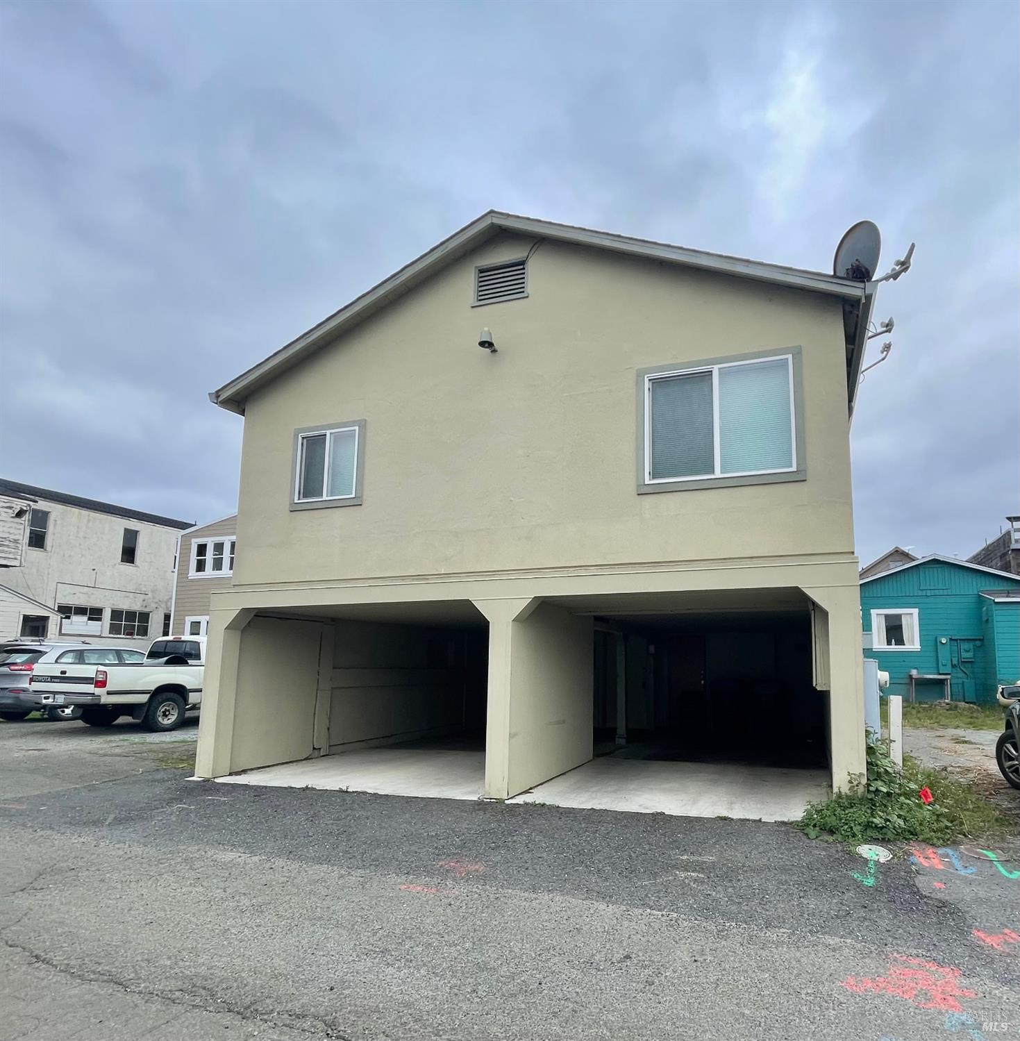 321 North Franklin Street Fort Bragg, CA 95437 - Photo 22 of 23 a front view of a house with parking space