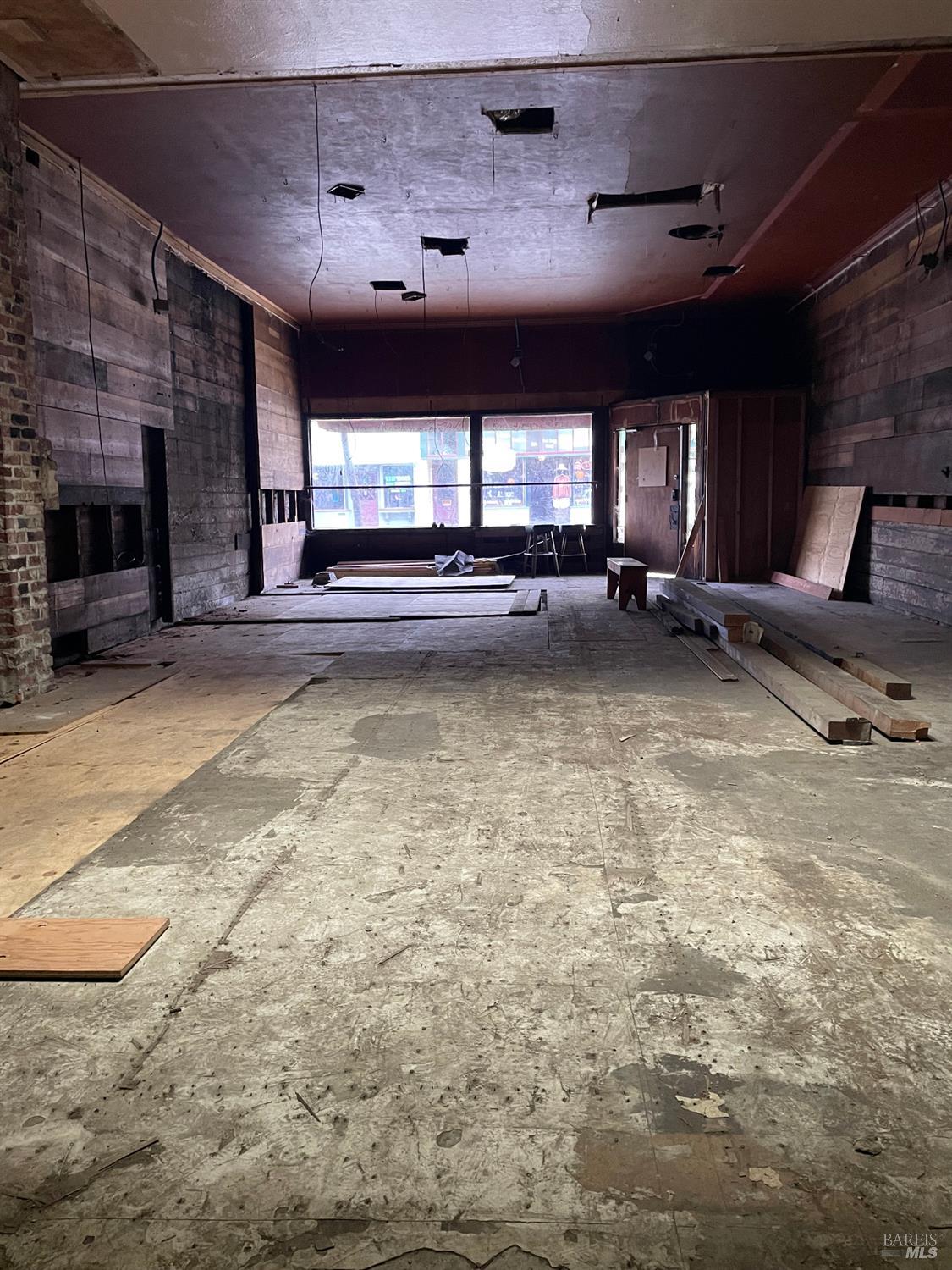 321 North Franklin Street Fort Bragg, CA 95437 - Photo 3 of 23 a view of a livingroom with furniture window and a fireplace