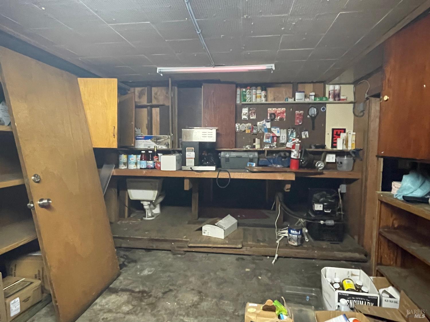 321 North Franklin Street Fort Bragg, CA 95437 - Photo 10 of 23 a room with granite countertop lots of wooden furniture