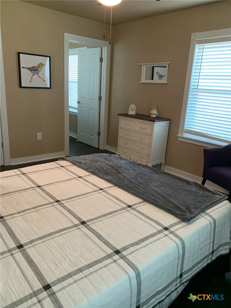 952 Fannin Loop Temple, TX 76501 - Photo 15 of 17 a bedroom with a bed and a window