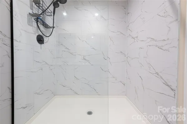 a bathroom with a bath tub