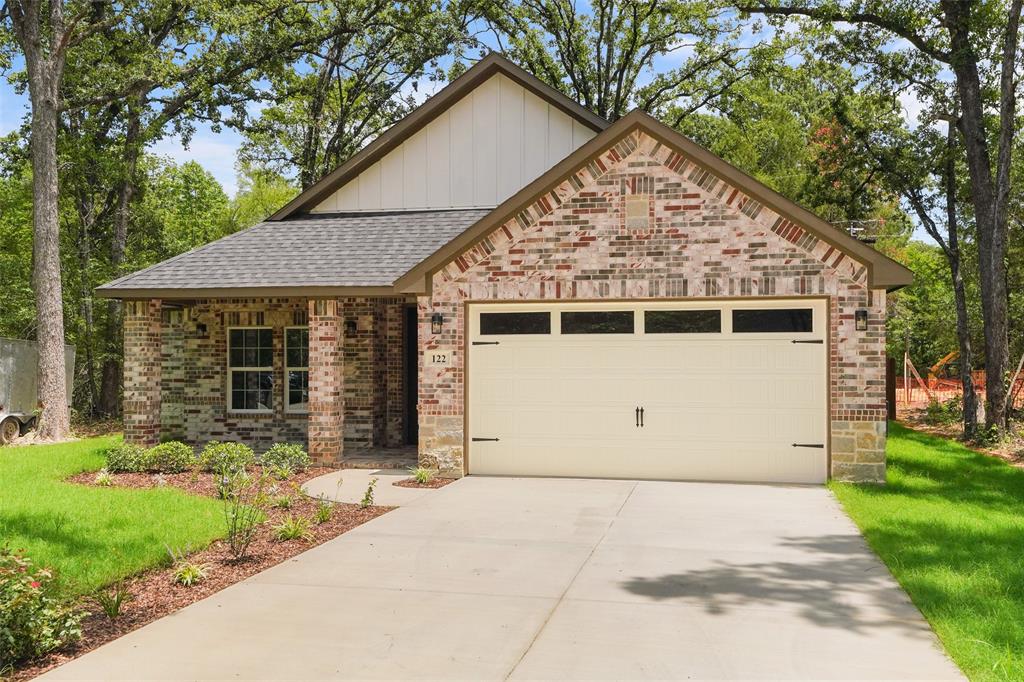 122 East Beachwood Loop Trinidad, TX 75163 - Photo 2 of 35 Brick exterior with stone accents and a gabled roofline