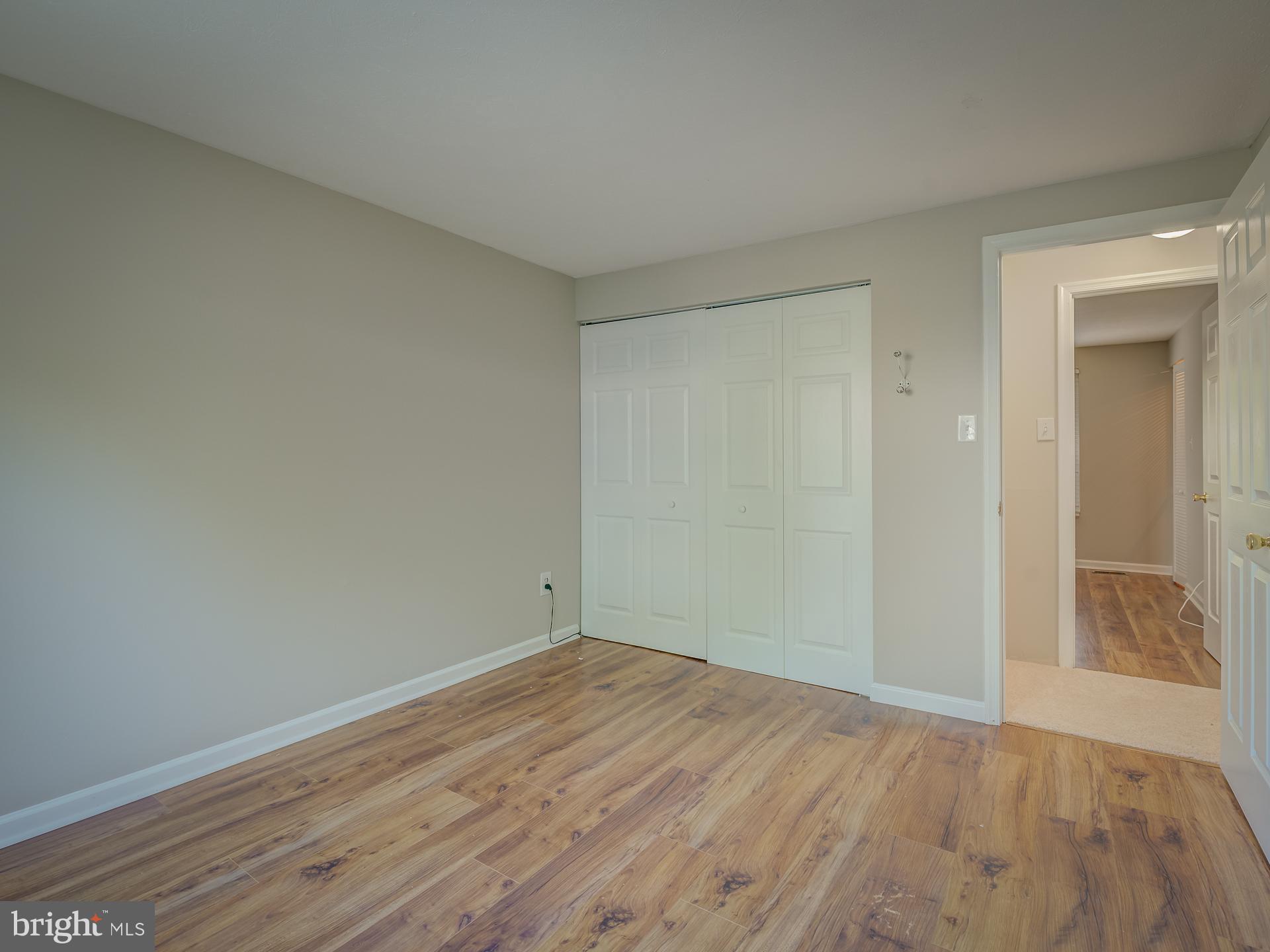 10833 Split Oak Lane Burke, VA 22015 - Photo 30 of 47 a view of an empty room