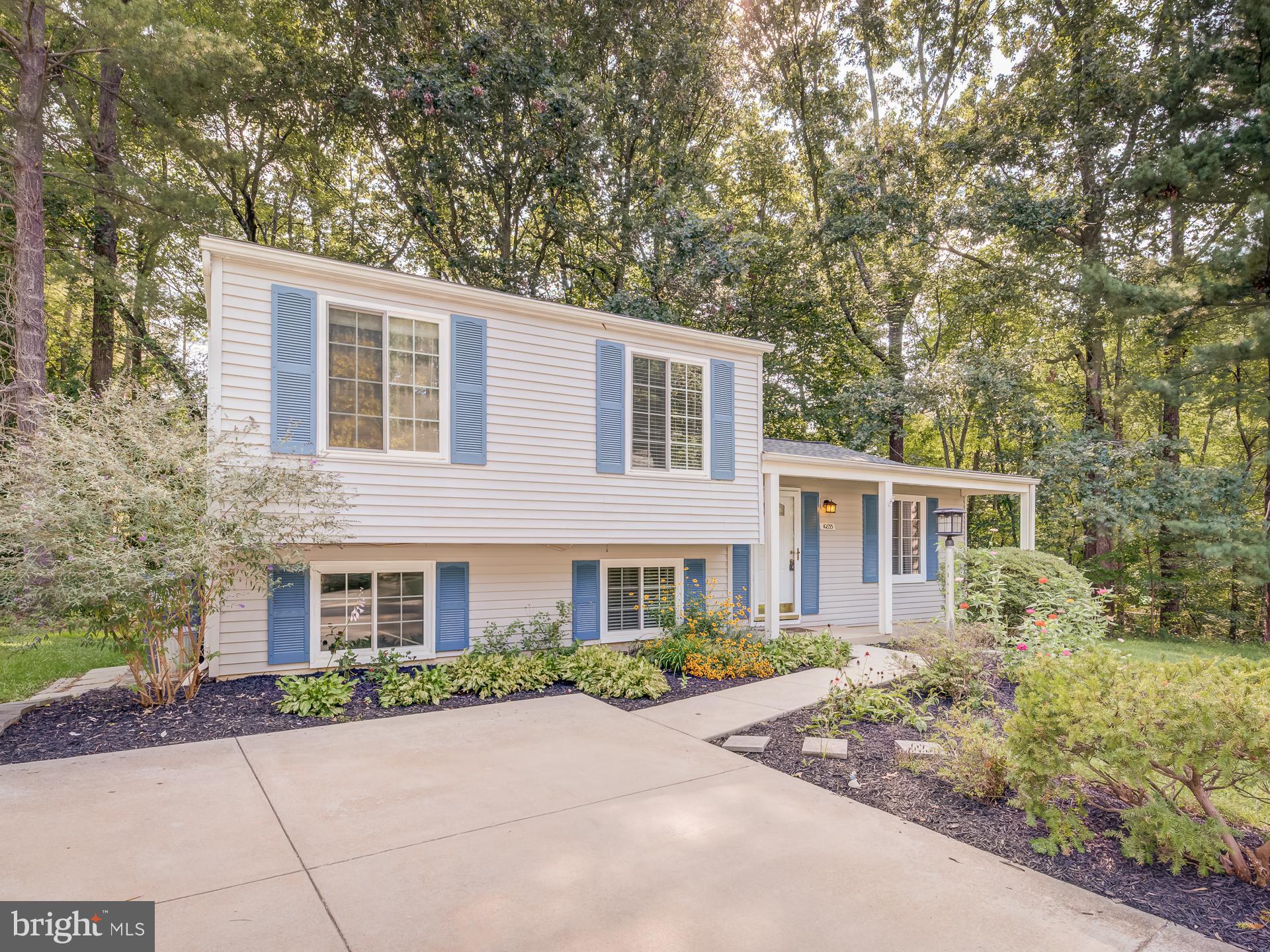 10833 Split Oak Lane Burke, VA 22015 - Photo 6 of 47 front view of a house