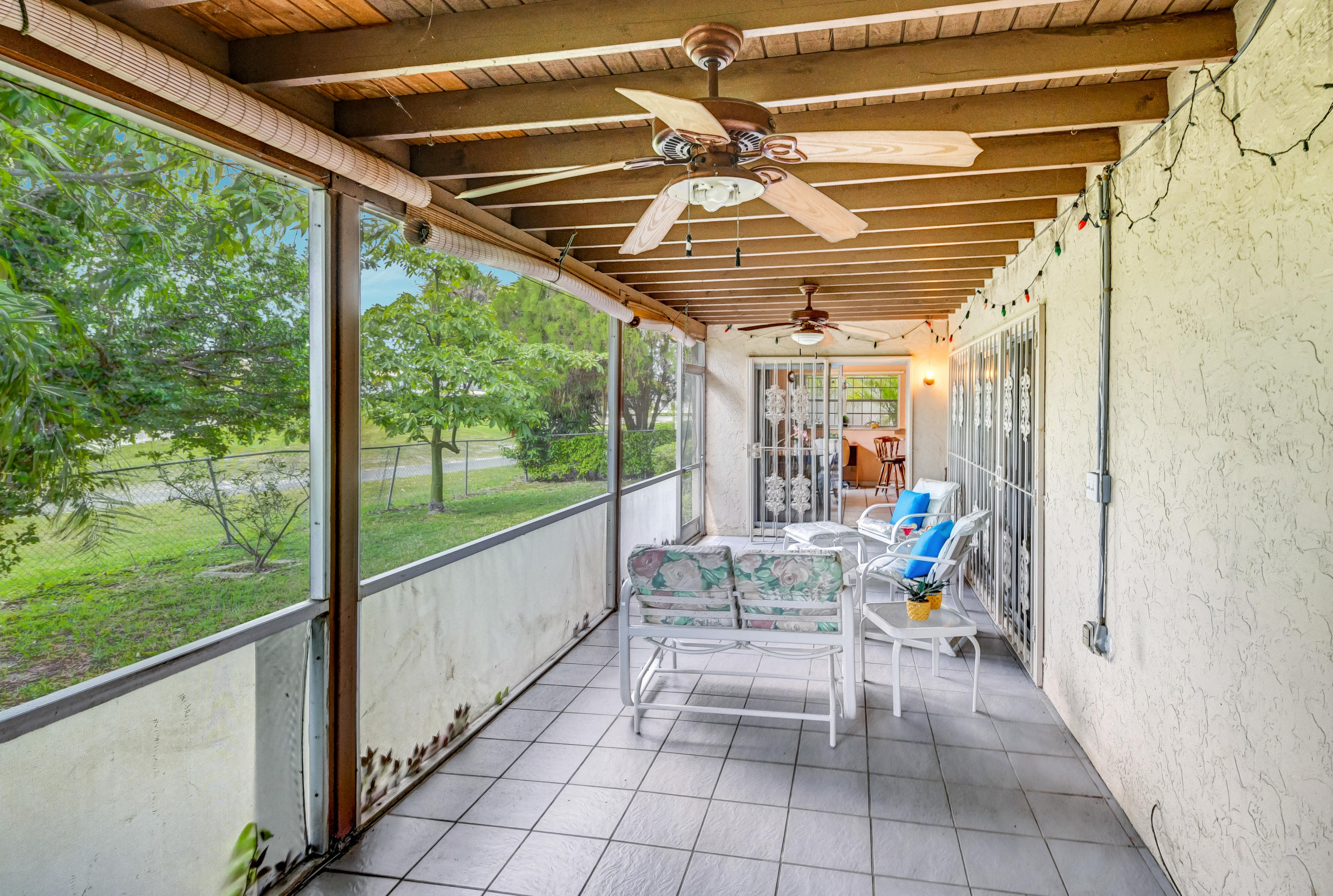 23111 Southwest 61st Avenue Boca Raton, FL 33428 - Photo 34 of 55 Screened in Patio