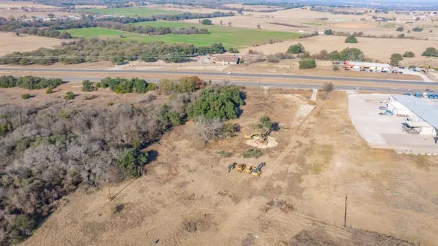 a view of balcony with wooden floor