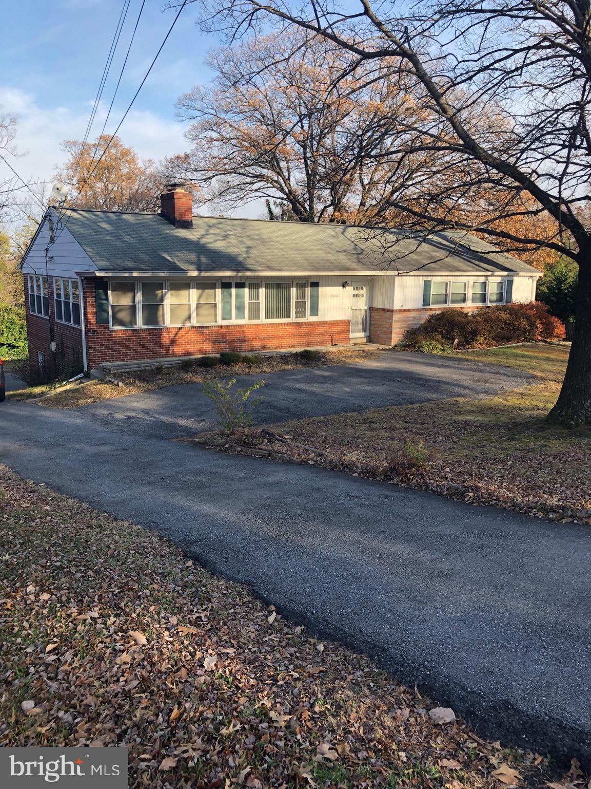 10005 Riggs Road Adelphi, MD 20783 - Photo 1 of 32 a front view of house