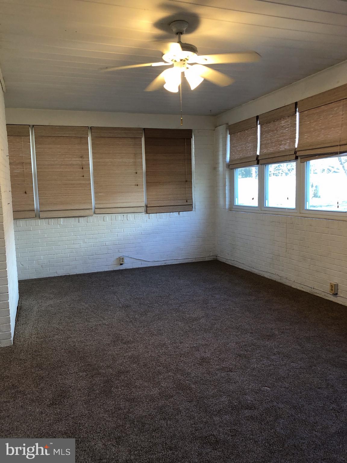 10005 Riggs Road Adelphi, MD 20783 - Photo 15 of 32 a view of an empty room with a window