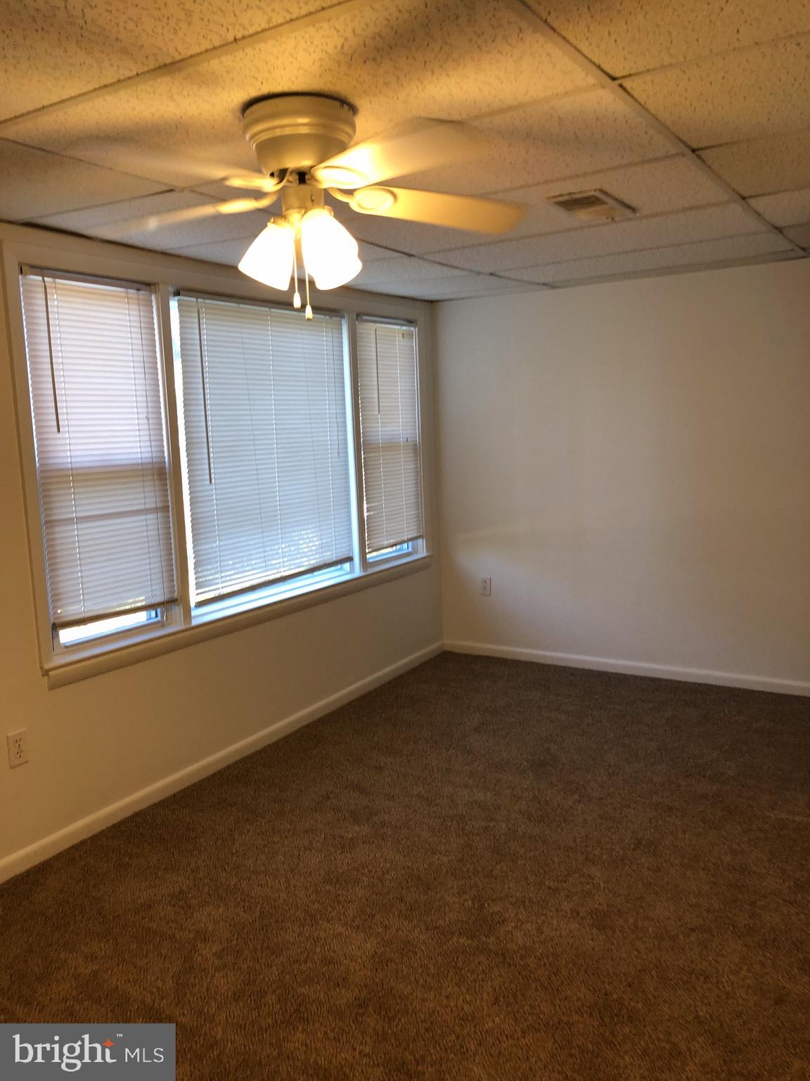 10005 Riggs Road Adelphi, MD 20783 - Photo 20 of 32 a view of an empty room with a window
