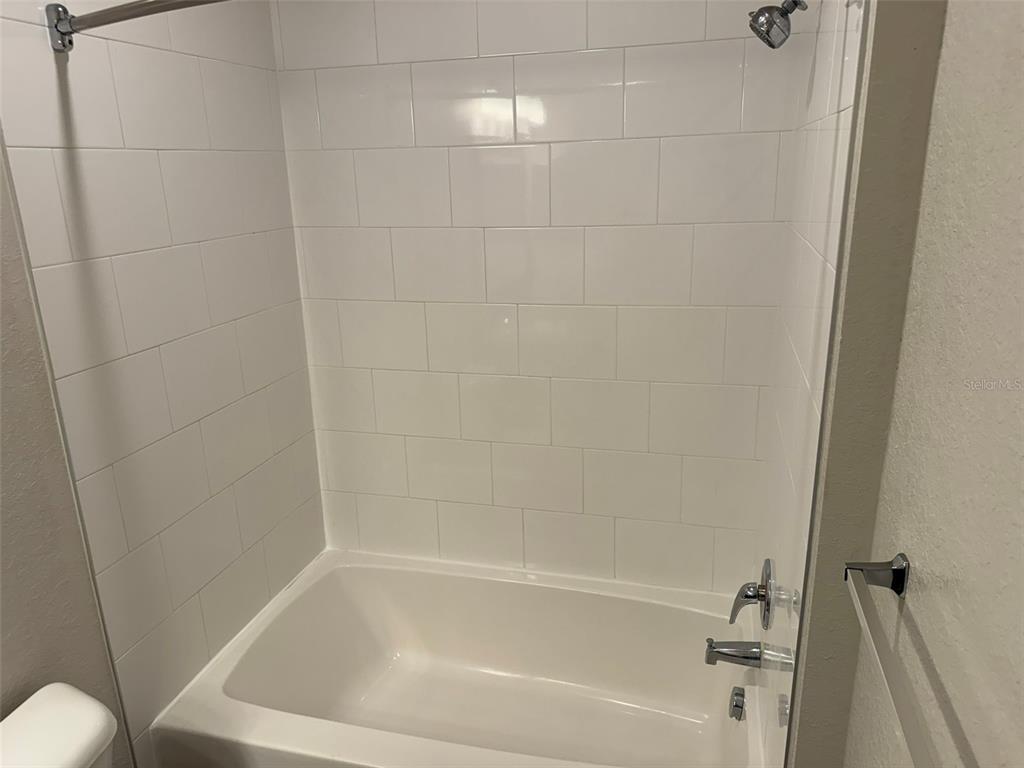2420 Ann Rou Road, Unit 201 Tavares, FL 32778 - Photo 19 of 25 a close view of a bathtub in bathroom