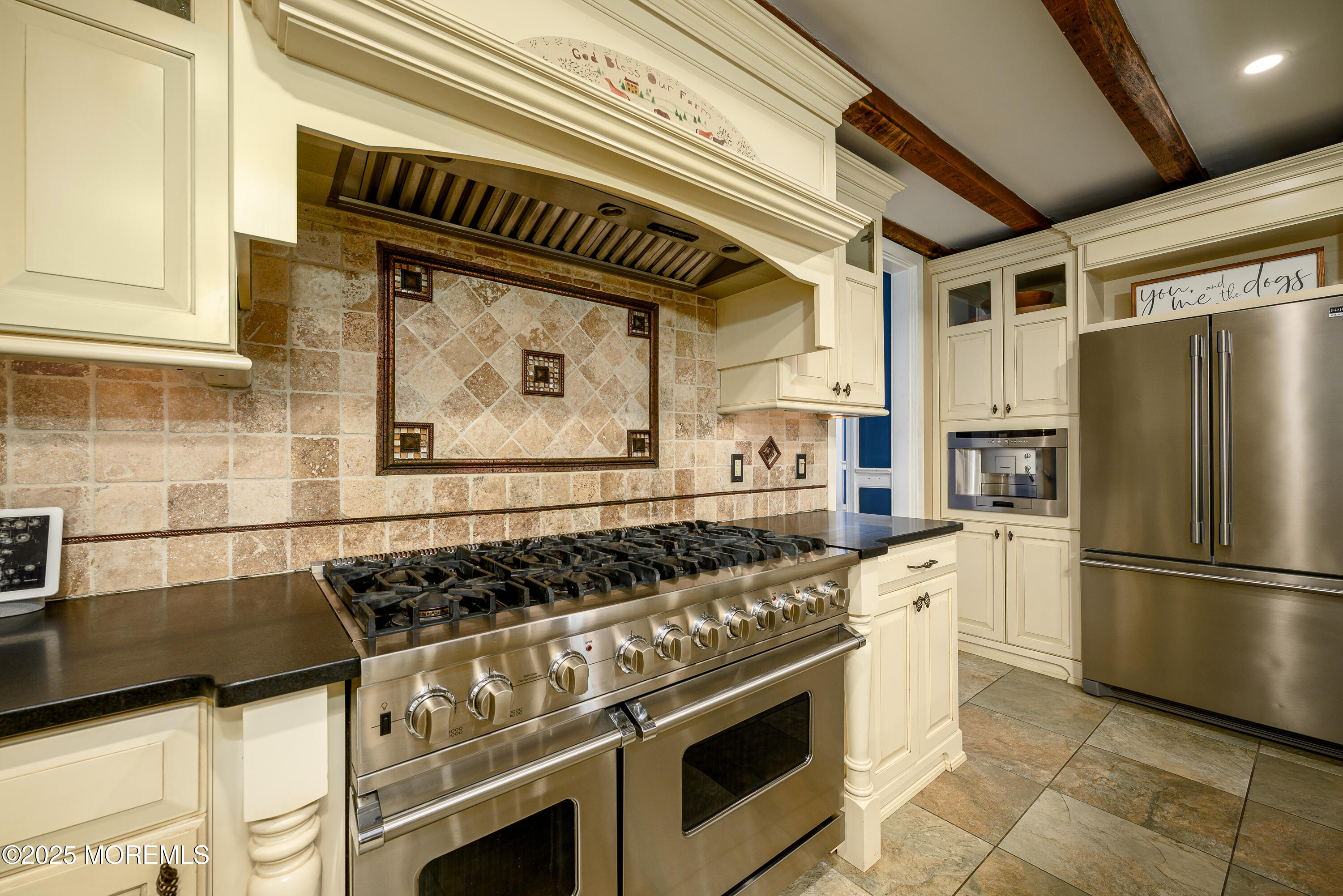 60 Conover Road Colts Neck, NJ 07722 - Photo 15 of 56 a kitchen with a stove and a refrigerator