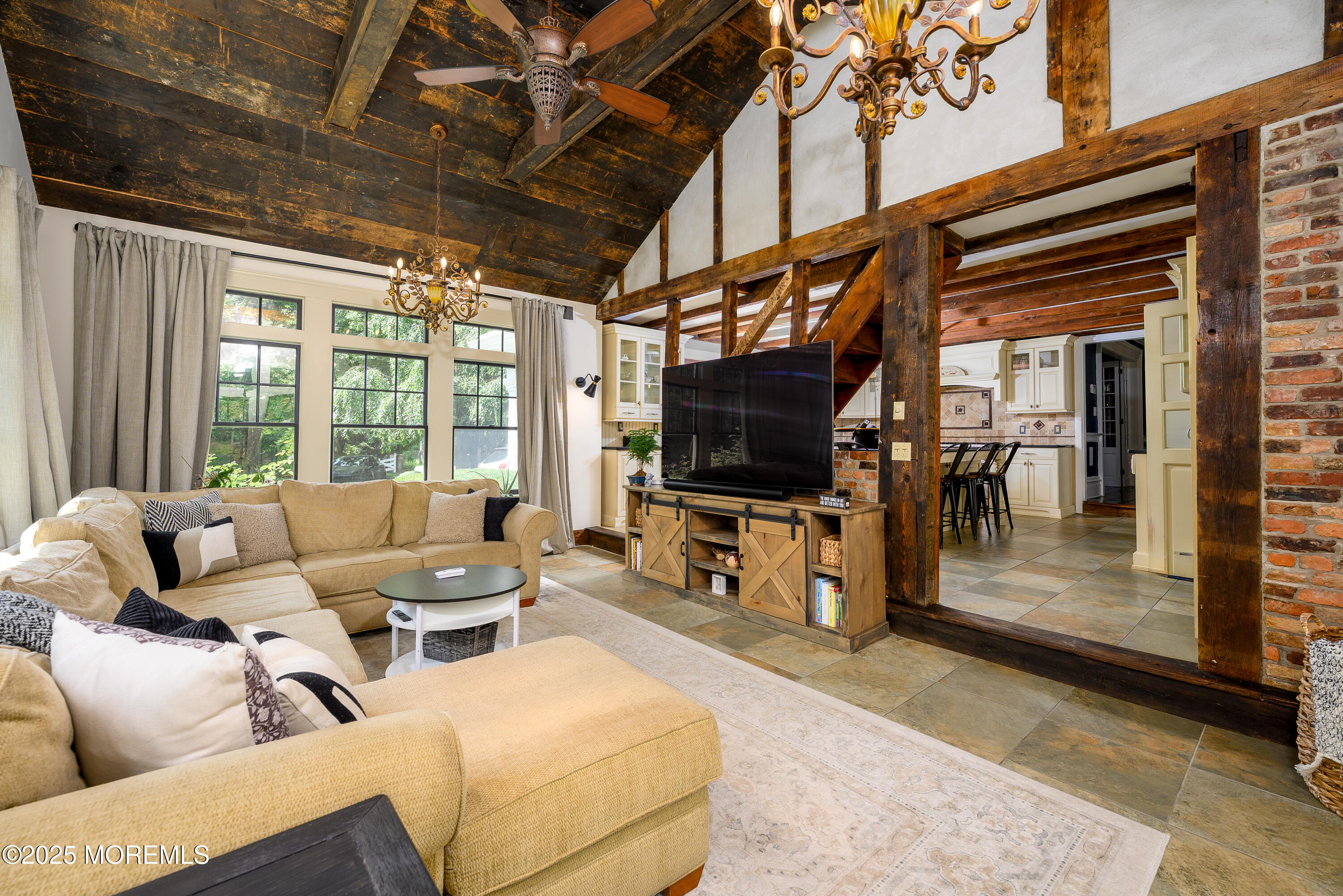 60 Conover Road Colts Neck, NJ 07722 - Photo 18 of 56 a living room with furniture and a flat screen tv
