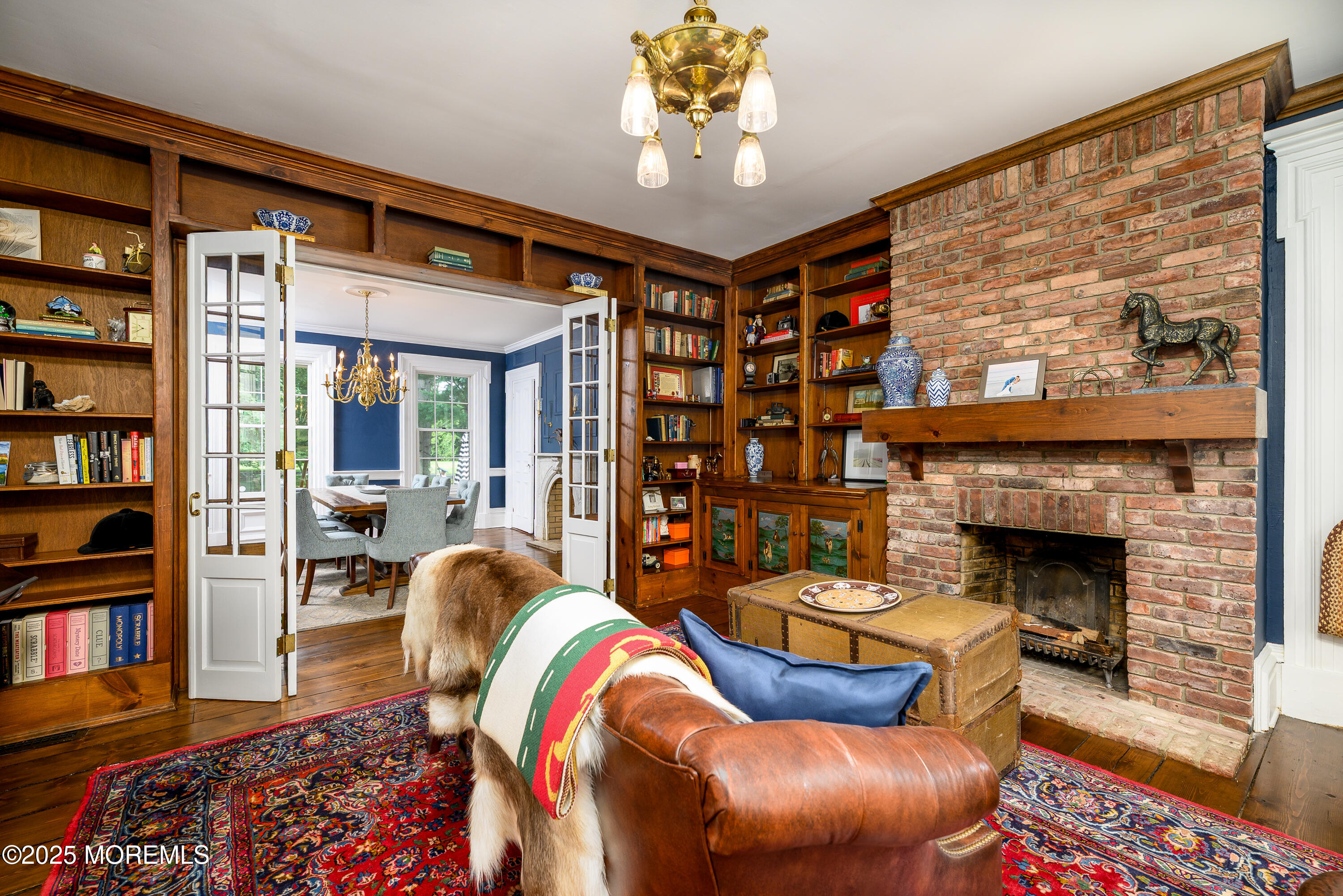 60 Conover Road Colts Neck, NJ 07722 - Photo 21 of 56 a living room with furniture and a fireplace