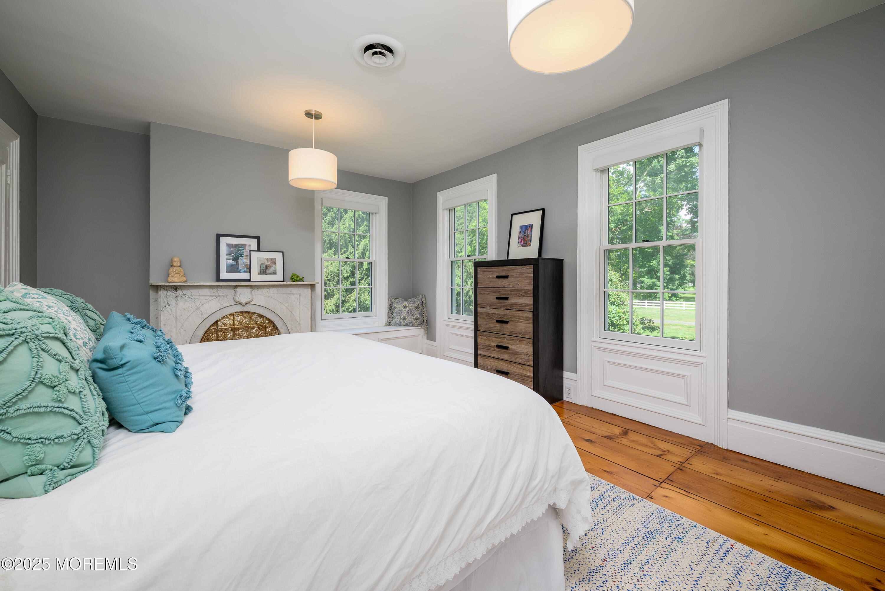 60 Conover Road Colts Neck, NJ 07722 - Photo 26 of 56 a bedroom with a bed and a large window