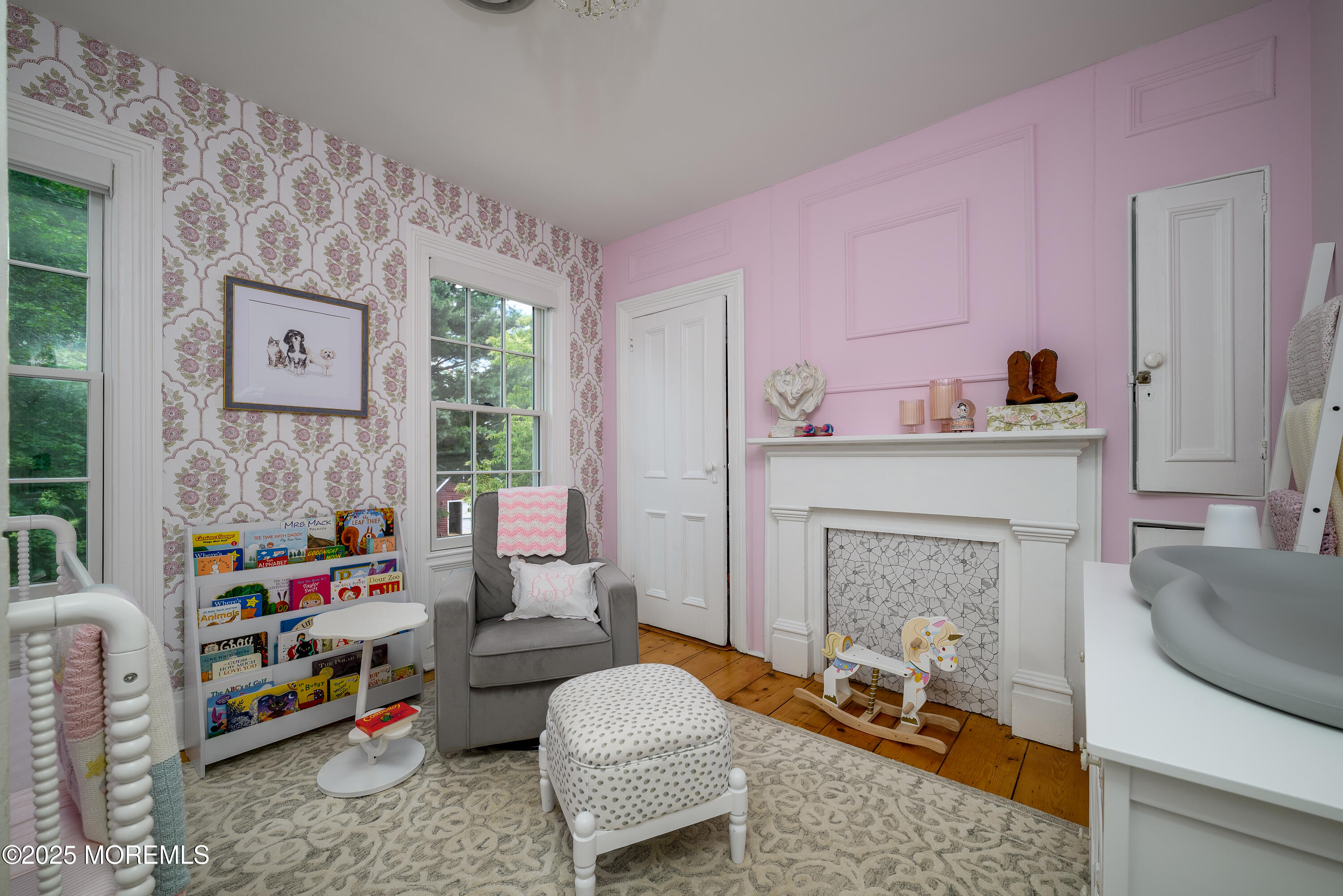 60 Conover Road Colts Neck, NJ 07722 - Photo 28 of 56 a children room with furniture and a fireplace