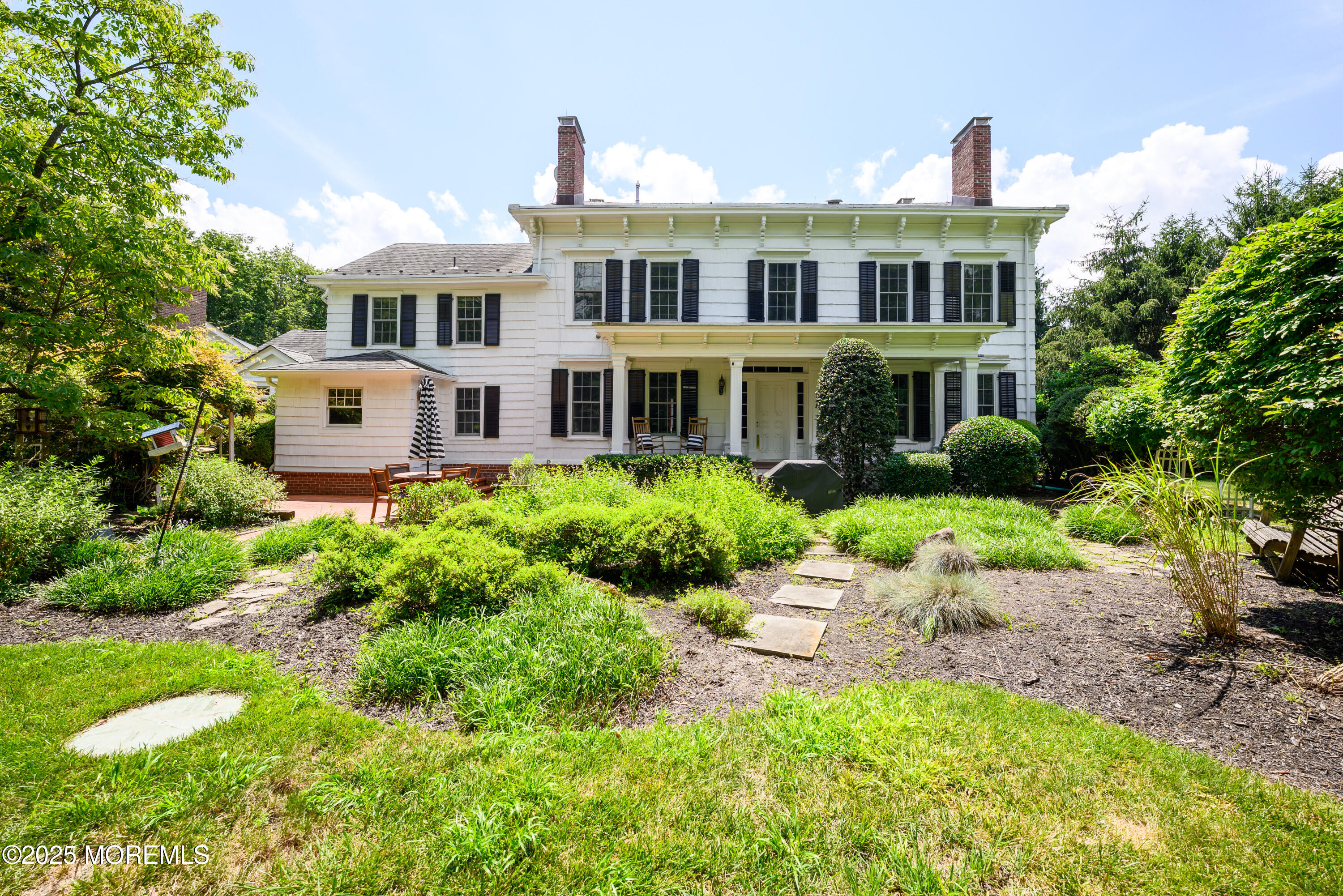 60 Conover Road Colts Neck, NJ 07722 - Photo 4 of 56 a front view of a house with garden