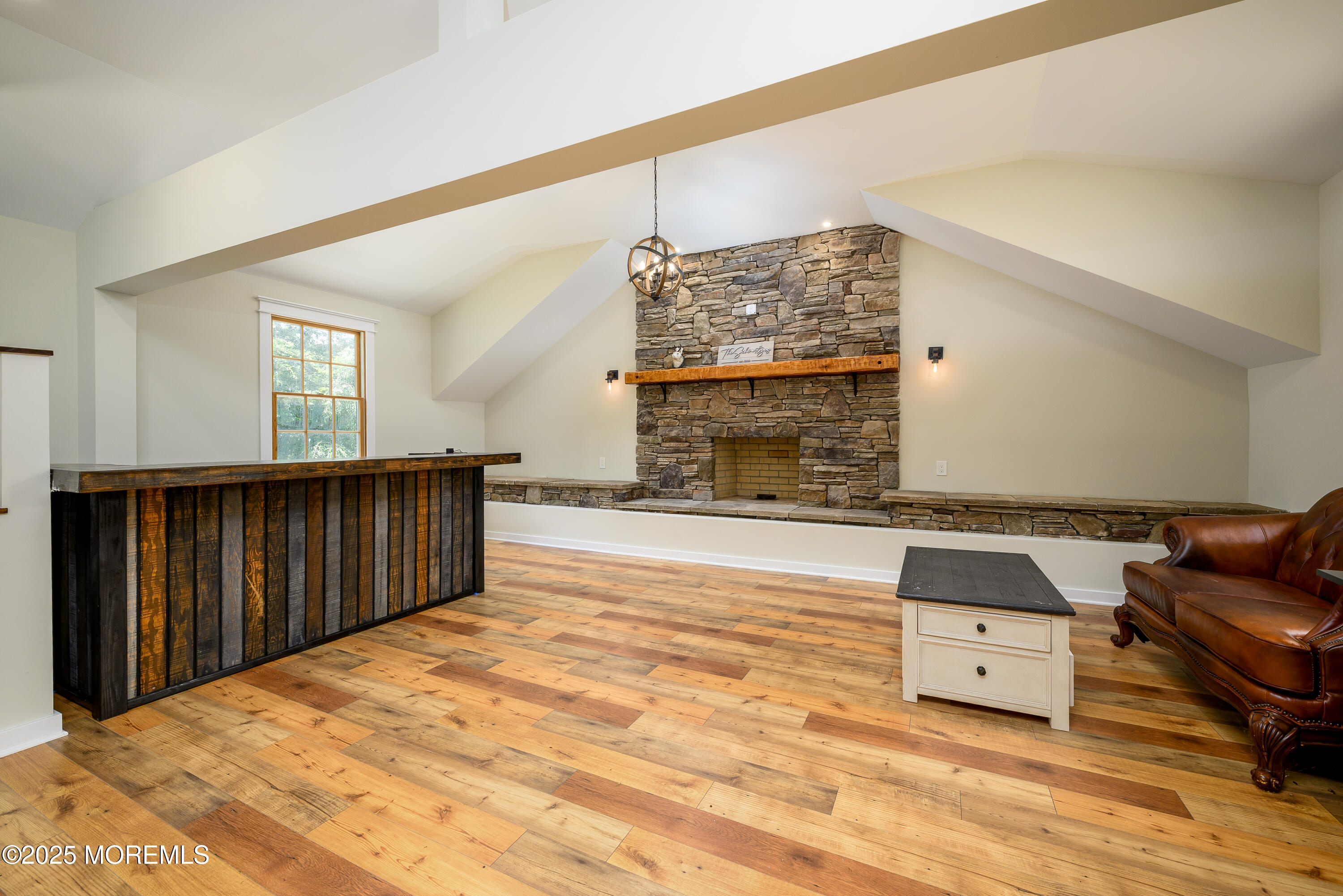 60 Conover Road Colts Neck, NJ 07722 - Photo 43 of 56 a living room with furniture and a fireplace