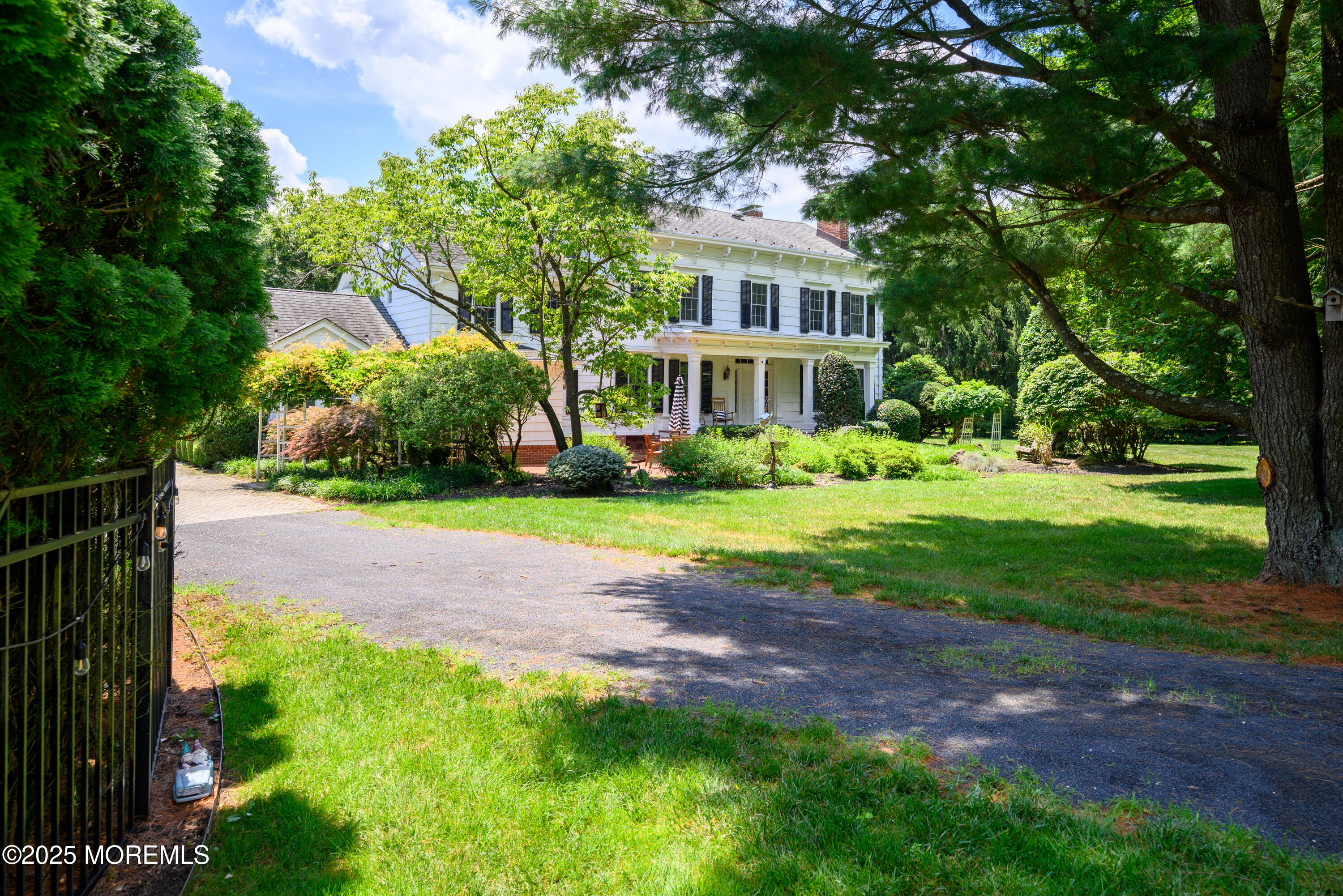 60 Conover Road Colts Neck, NJ 07722 - Photo 46 of 56 a view of a house with a yard