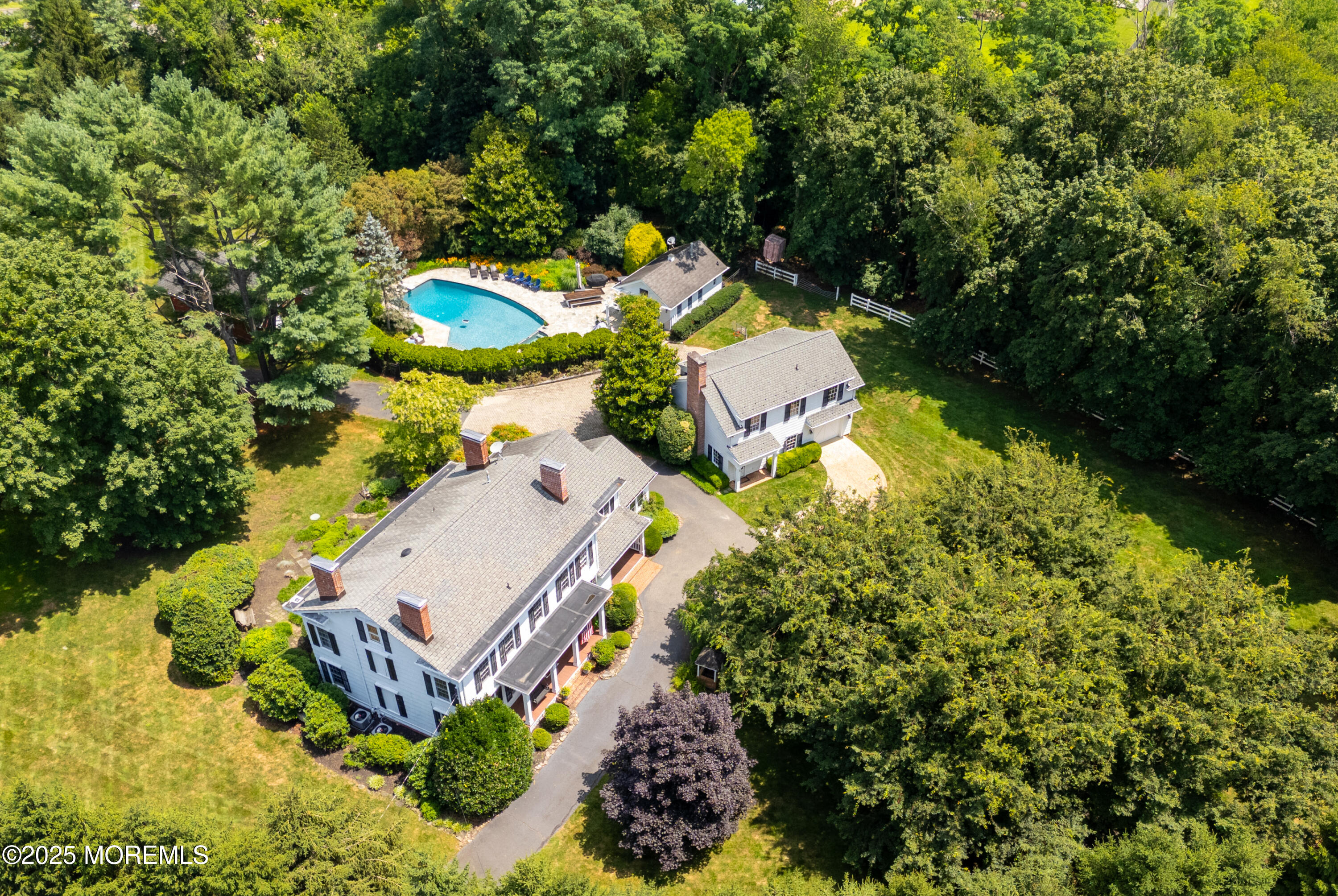 60 Conover Road Colts Neck, NJ 07722 - Photo 49 of 56 an aerial view of a house with a yard basket ball court and outdoor seating