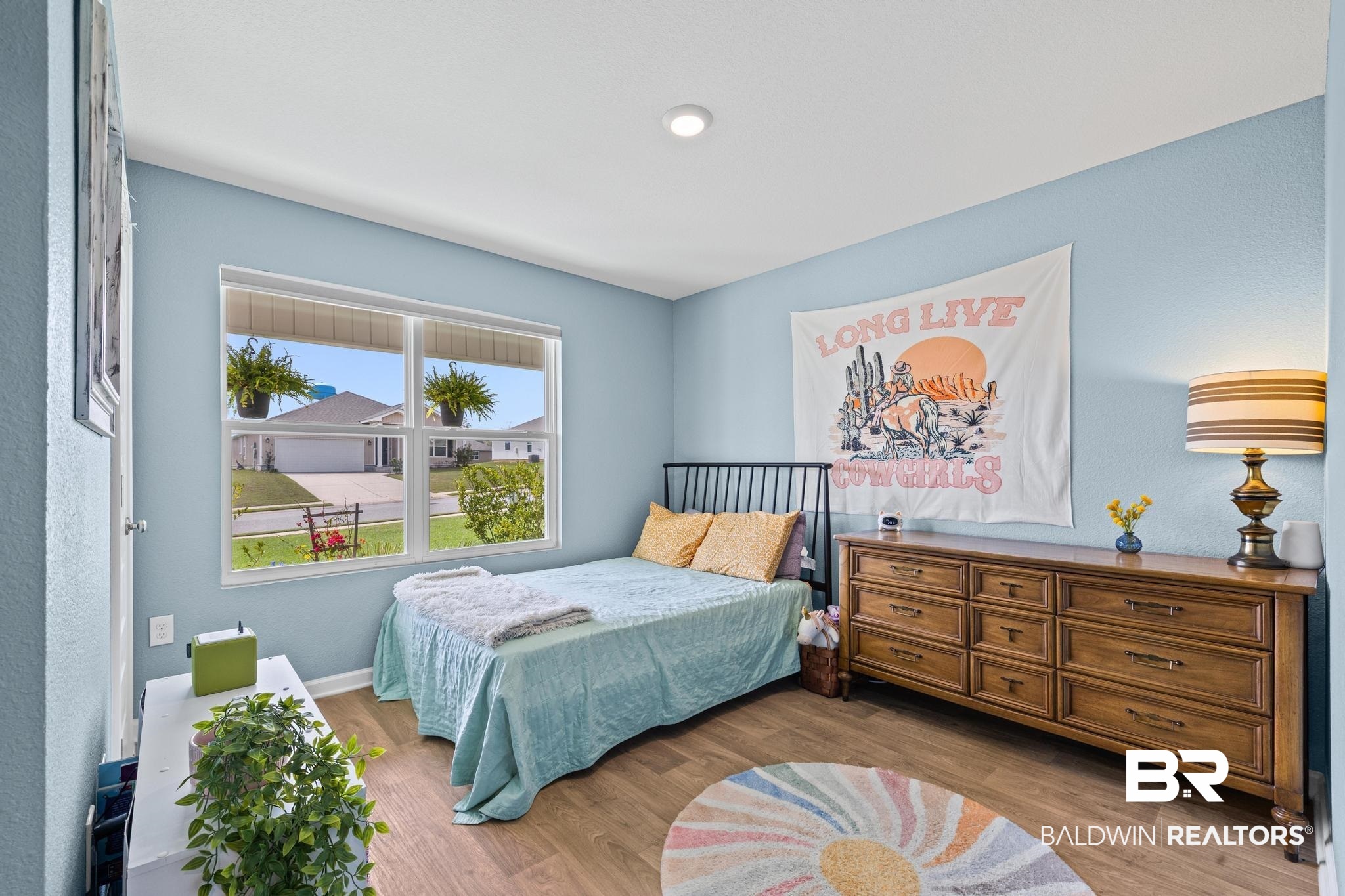 3078 Camino Real Loop Lillian, AL 36549 - Photo 22 of 51 Bedroom with light wood-type flooring and baseboards