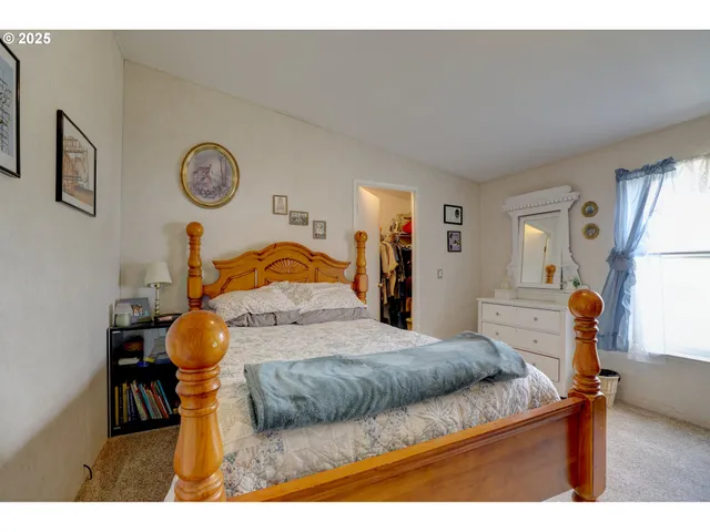 a bedroom with a bed and furniture