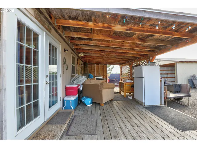 a view of a street with outdoor seating