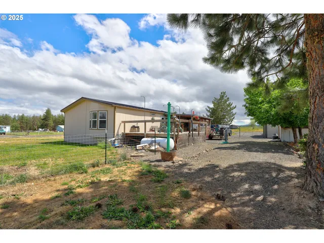 a view of an outdoor space and a lake view
