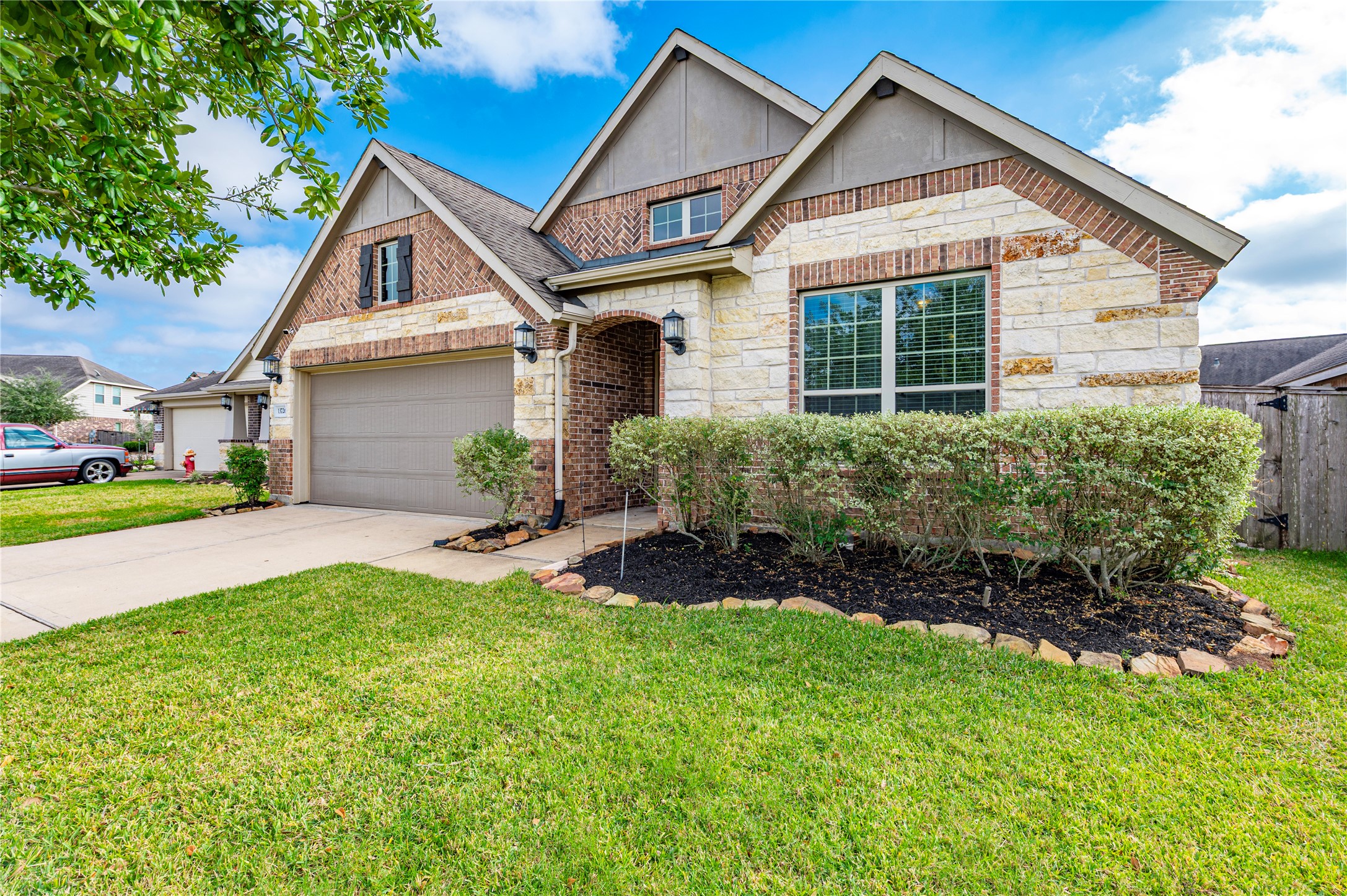 13726 Madera Bend Lane Rosharon, TX 77583 - Photo 2 of 34 a view of a yard in front of house