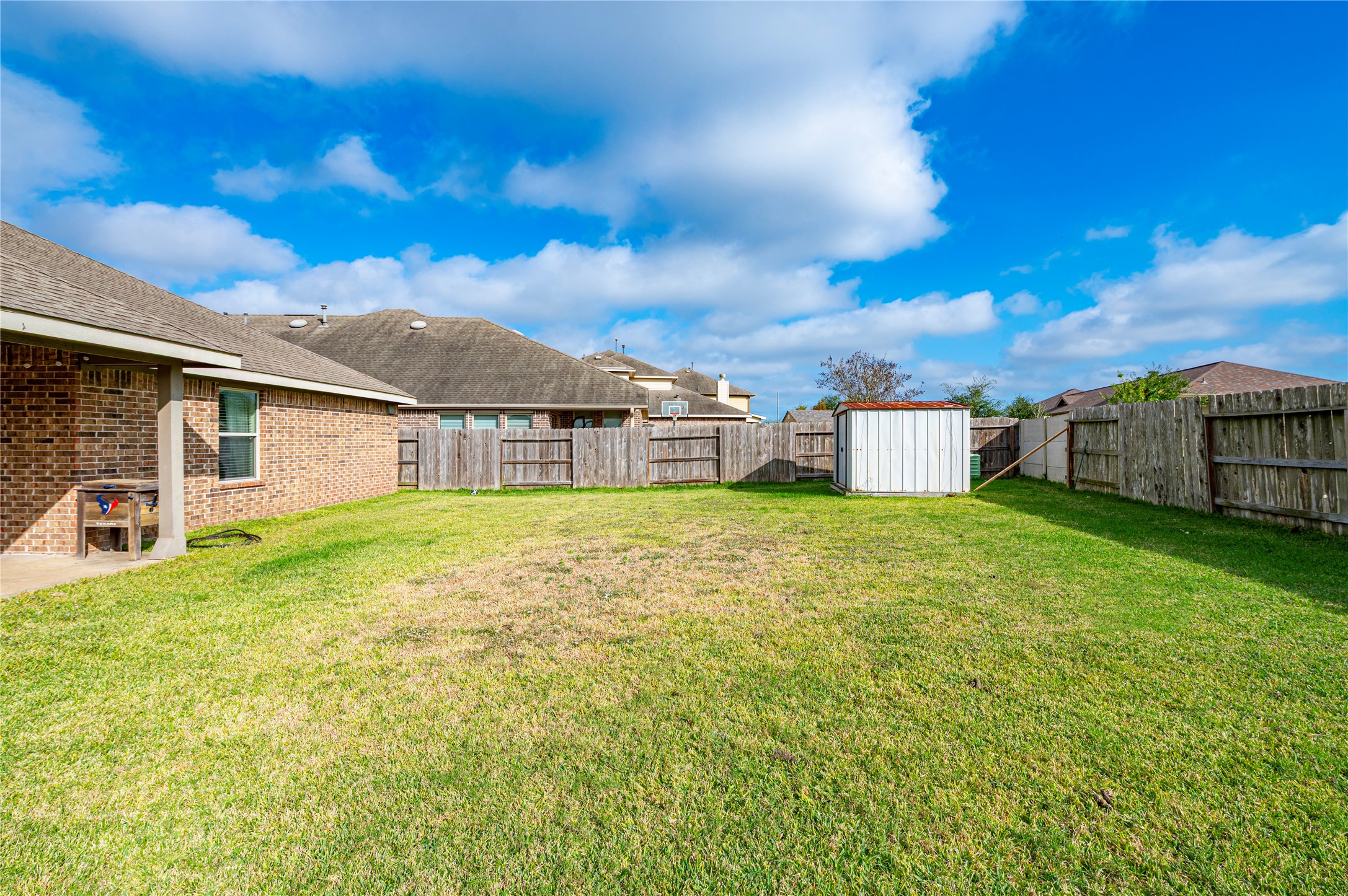 13726 Madera Bend Lane Rosharon, TX 77583 - Photo 30 of 34 a house view with a garden space