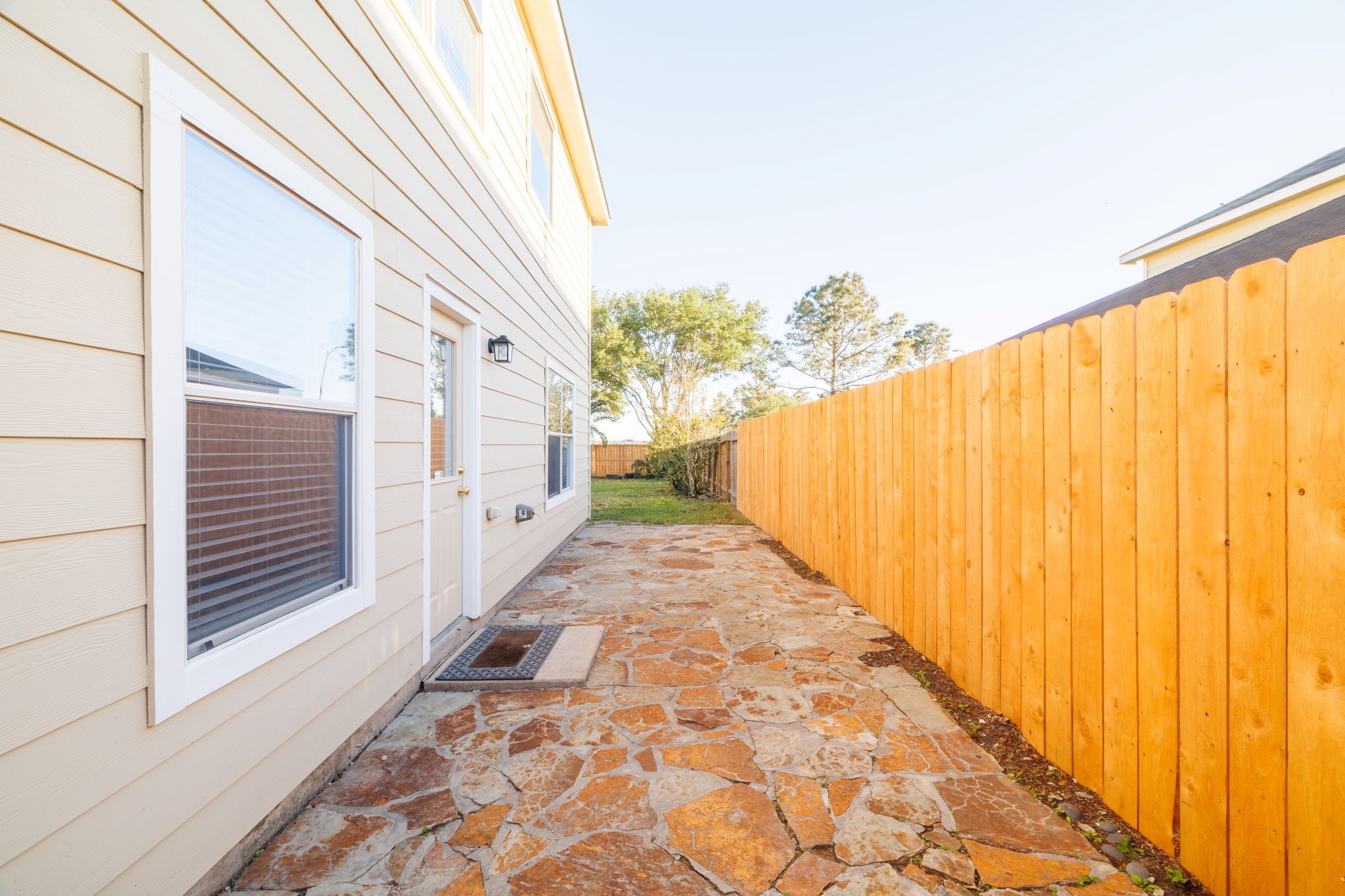 8318 Tartan Court Rosharon, TX 77583 - Photo 22 of 31 Side yard stone patio.
