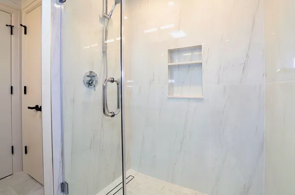 a bathroom with a toilet sink and bathtub