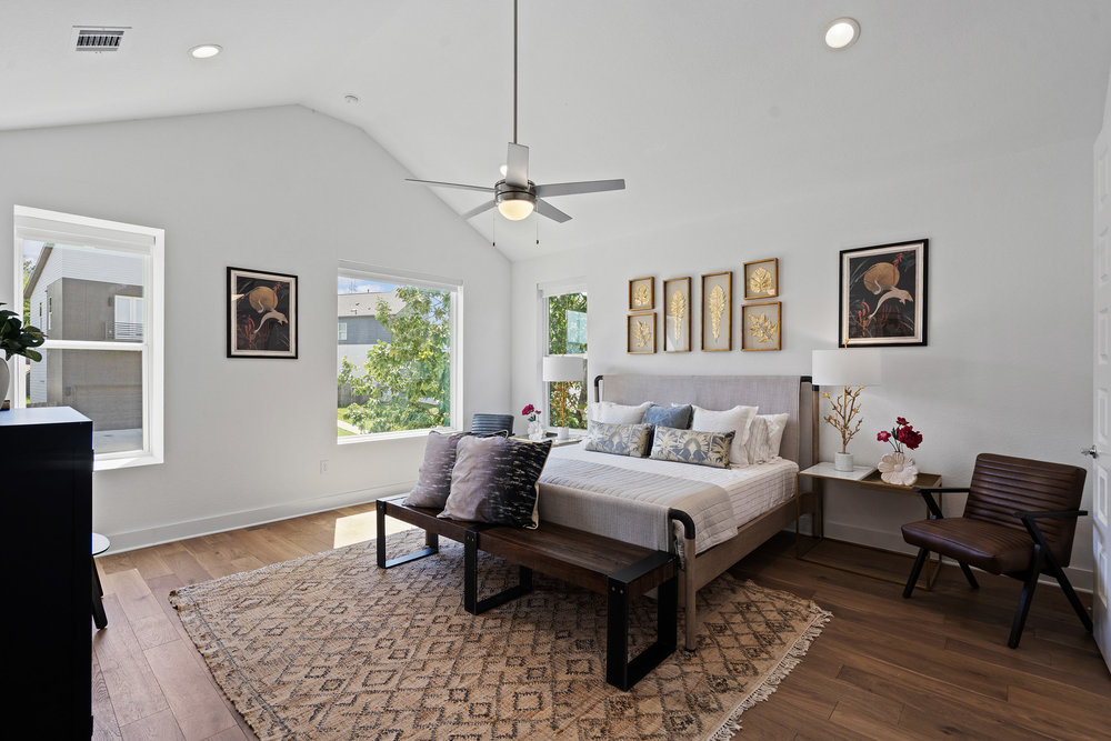 5324 Agatha Circle Austin, TX 78724 - Photo 15 of 34 a bedroom with a bed and a table