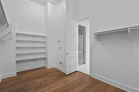 a living room with furniture and windows