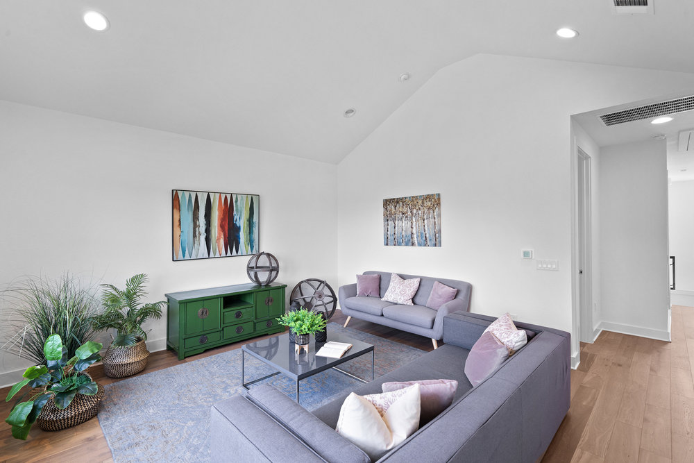 5324 Agatha Circle Austin, TX 78724 - Photo 24 of 34 a living room with furniture and a potted plant