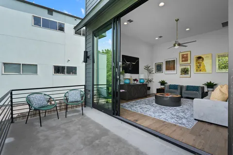 a view of a two chairs in the roof deck