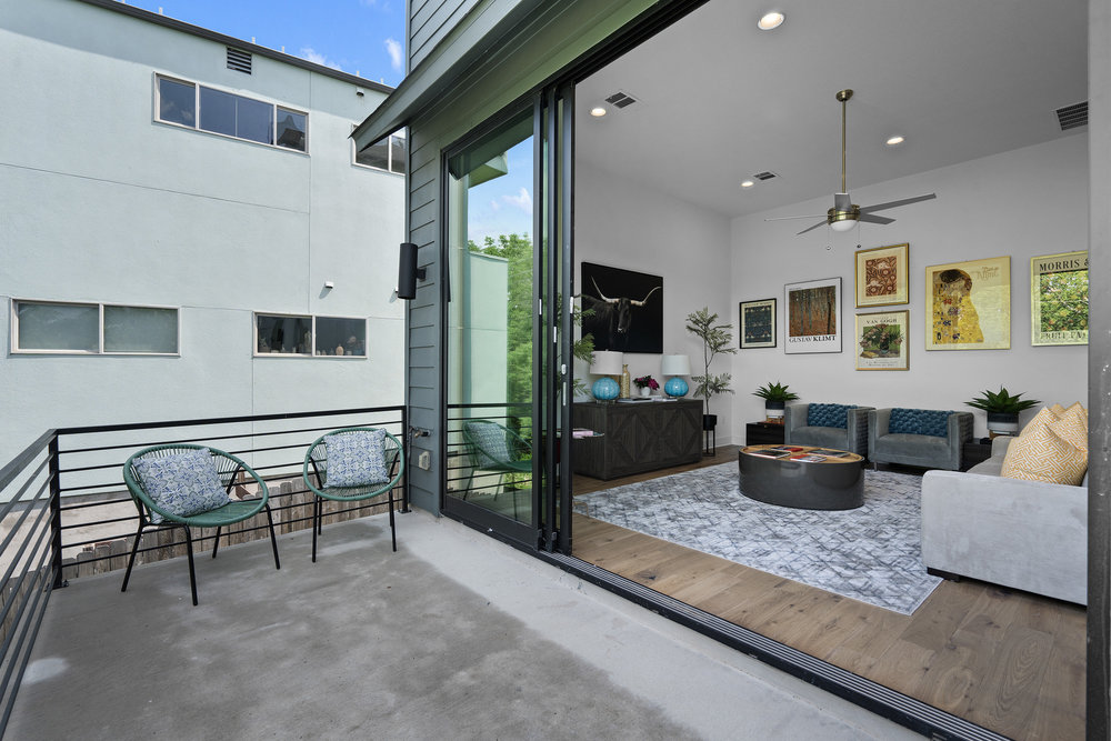 5324 Agatha Circle Austin, TX 78724 - Photo 31 of 34 a living room with furniture and a flat screen tv