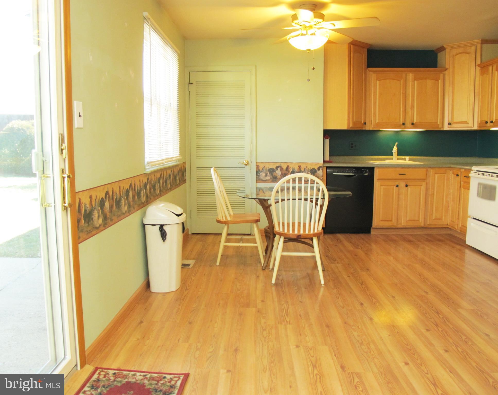 206 Paddock Way Delran, NJ 08075 - Photo 11 of 33 a view of a dining room with furniture and wooden floor